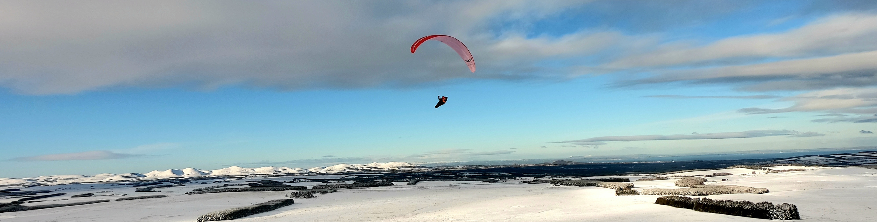 Paraglider over Moorfoots